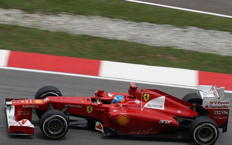Red Formula One Car — Dynamic, Photograph, Driver, Racetrack, Sponsors