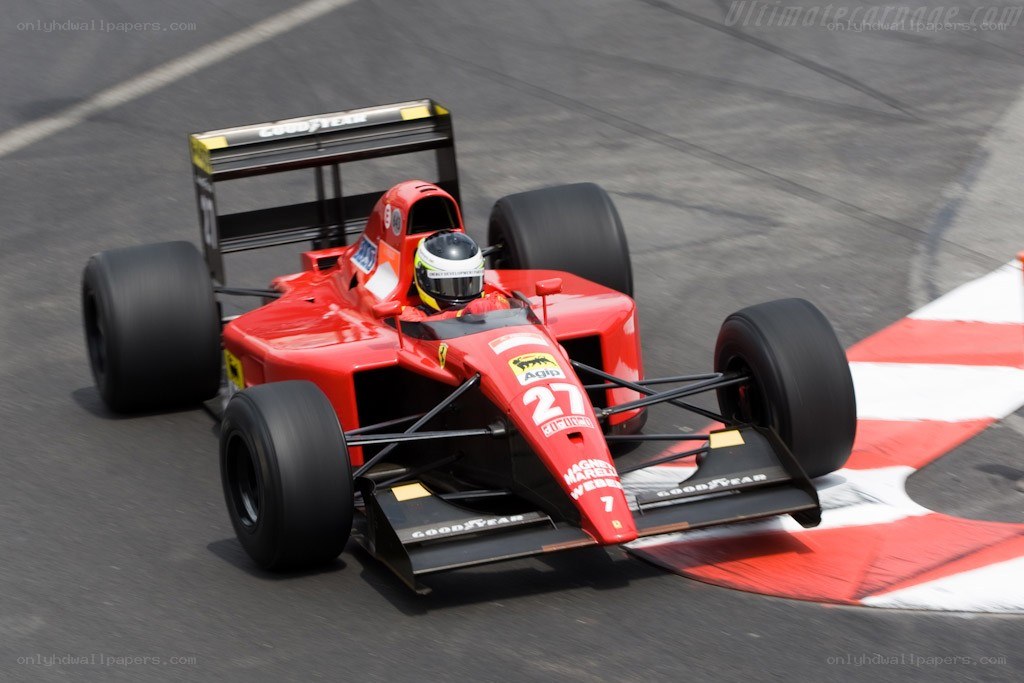 red formula one car on track