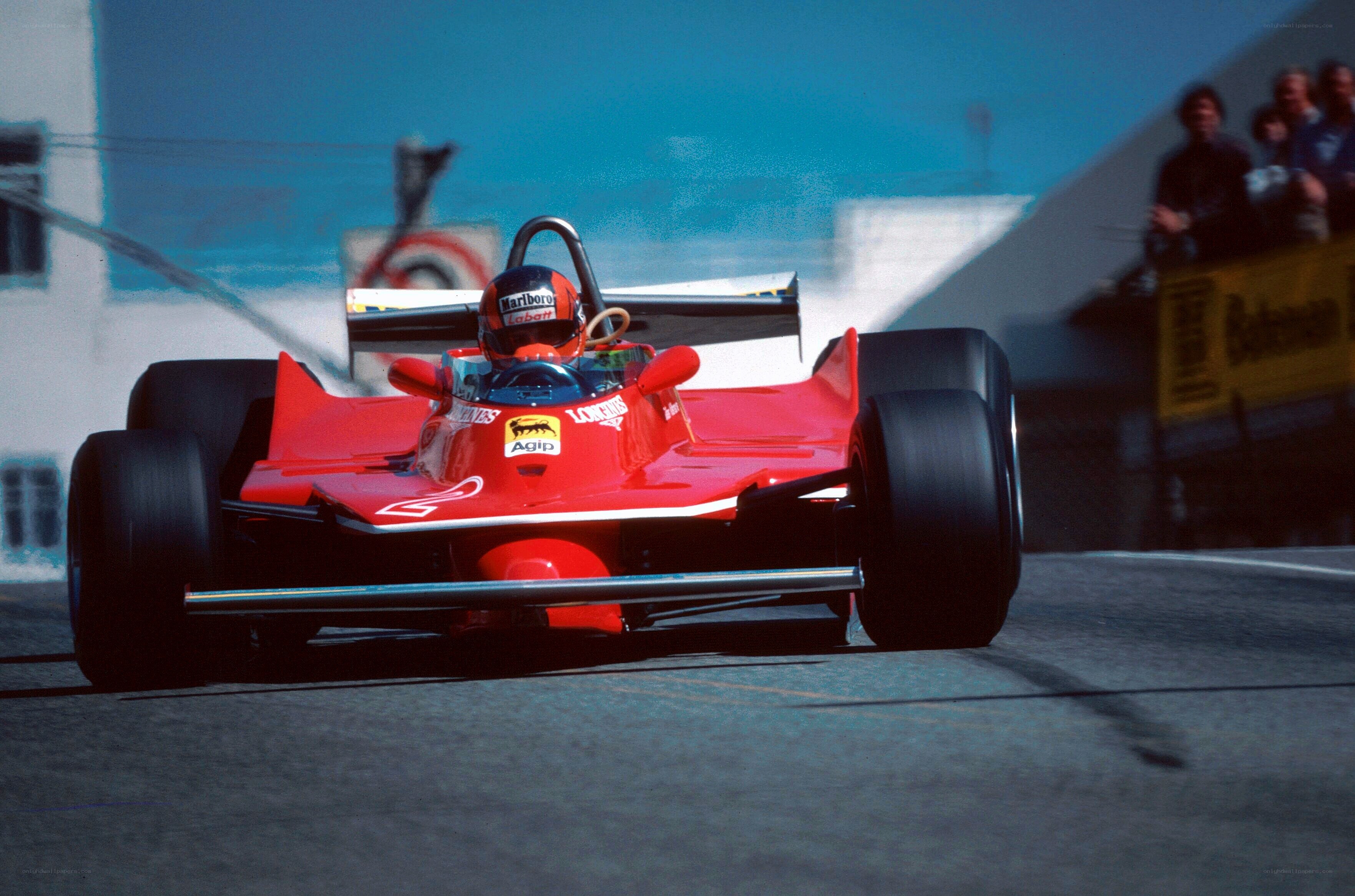 Red Formula One car on track