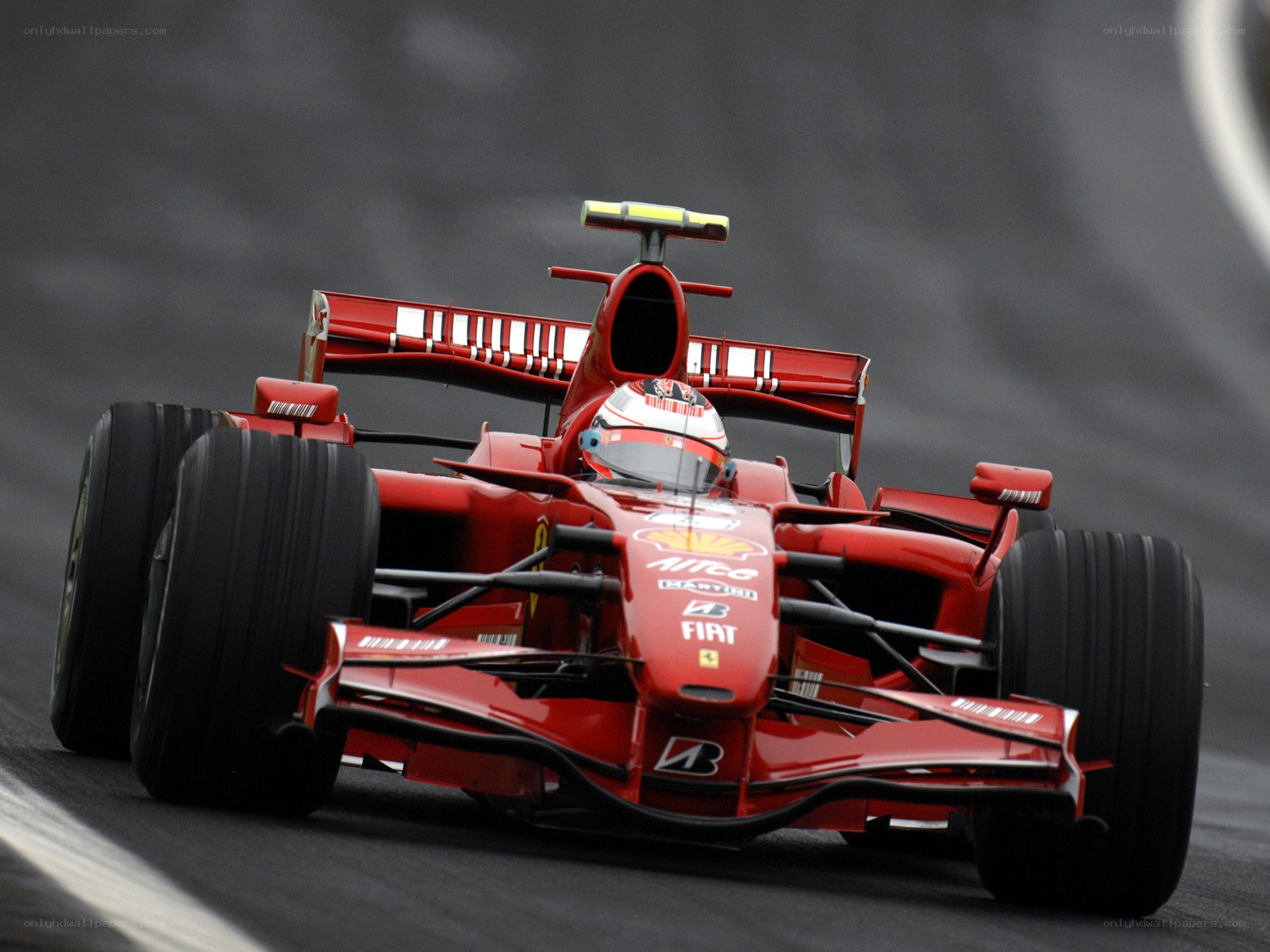 red formula one car on track