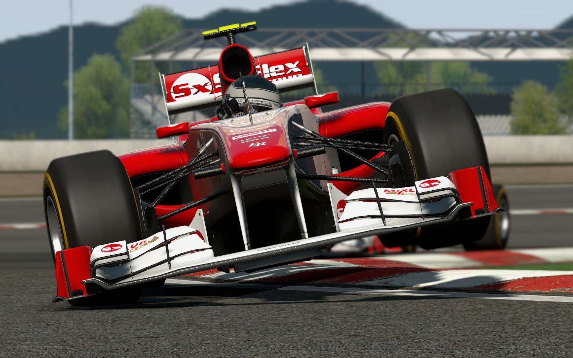 red formula one car on track