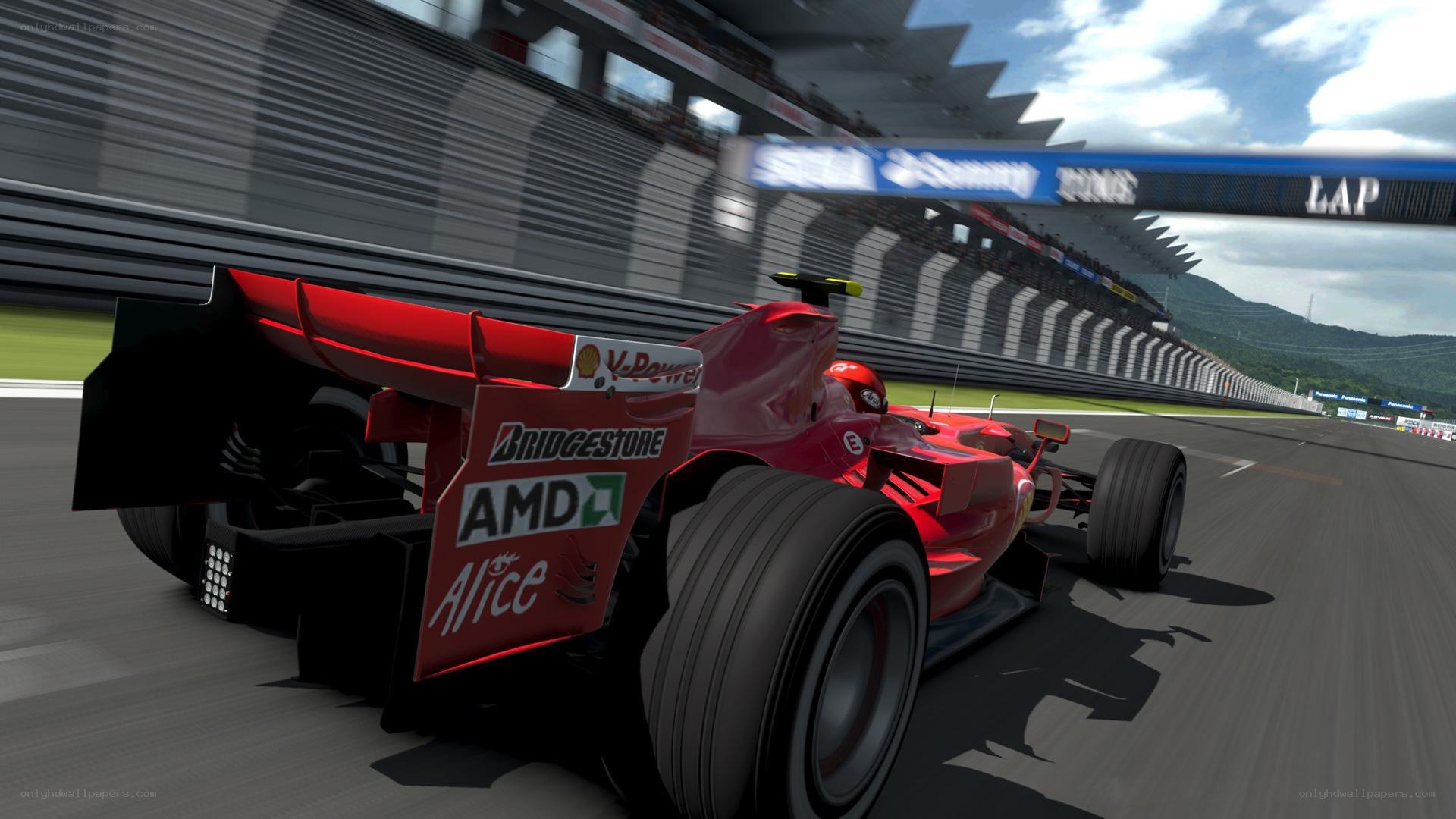 red formula one car on track