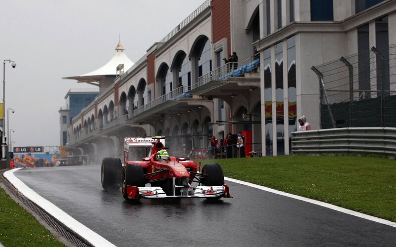 Red Formula One Car — Overcast