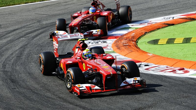 Red Formula One Cars — Dynamic, Afternoon, Photograph, Racing Track
