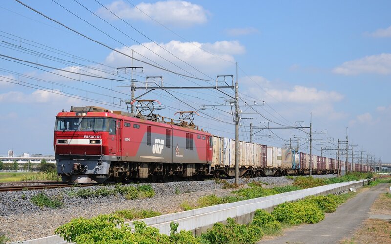Red freight train on tracks