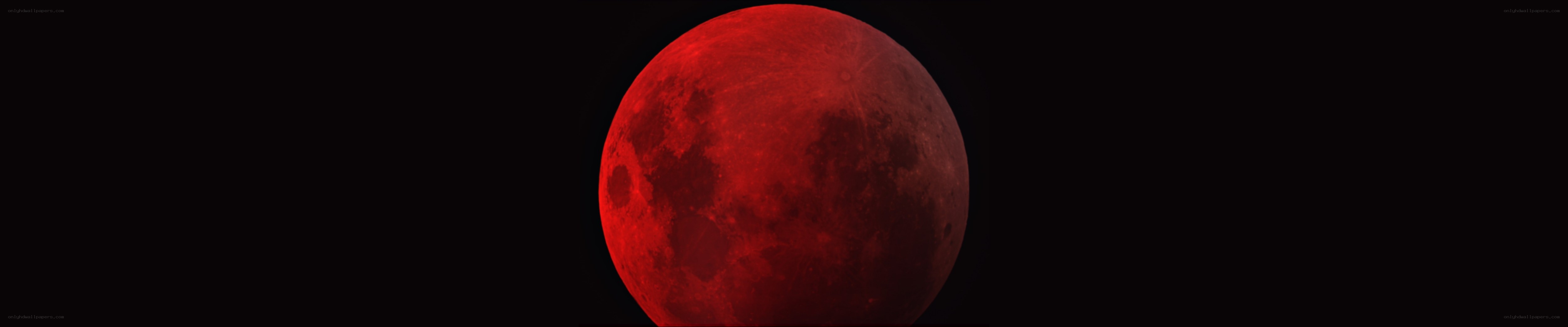 Red full moon in night sky