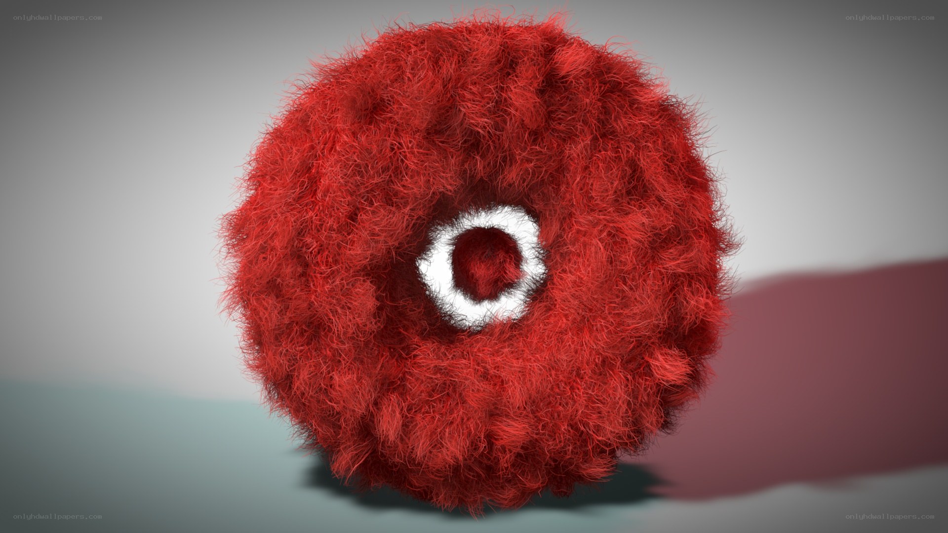 red furry sphere with eye