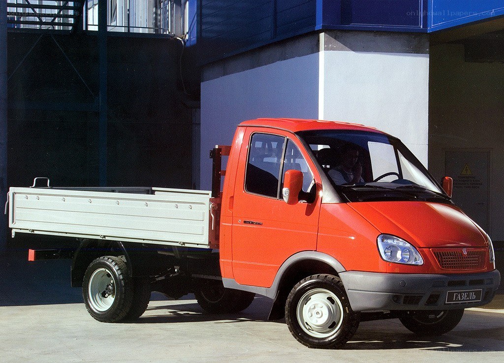 Red GAZEL truck with flatbed