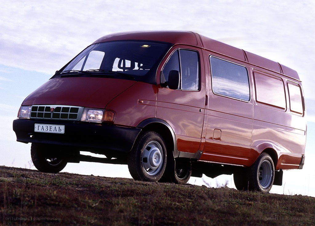 Red GAZELLE van on a hill