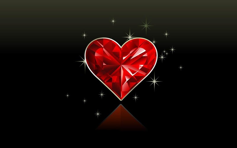 red gemstone heart with stars