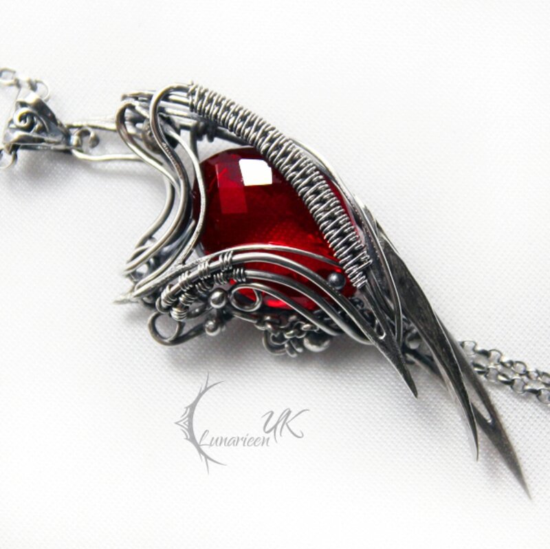 Red Gemstone Pendant — Dramatic, Photograph, Chain