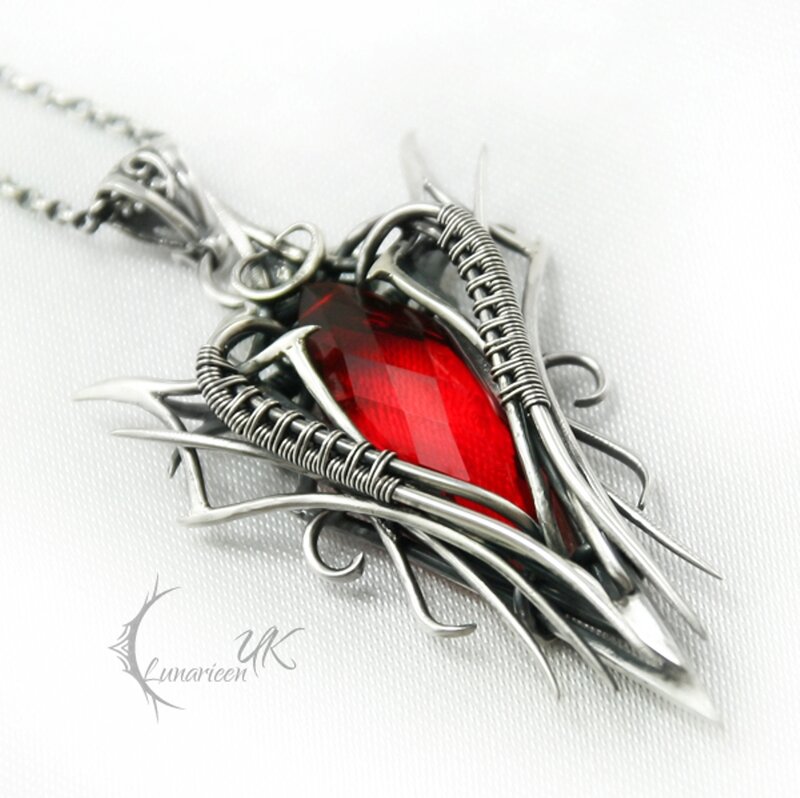 Red Gemstone Pendant — Dramatic