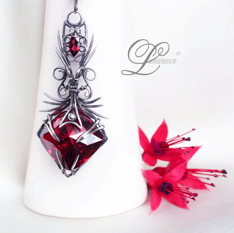 Red Gemstone Pendant — Elegant, Photograph