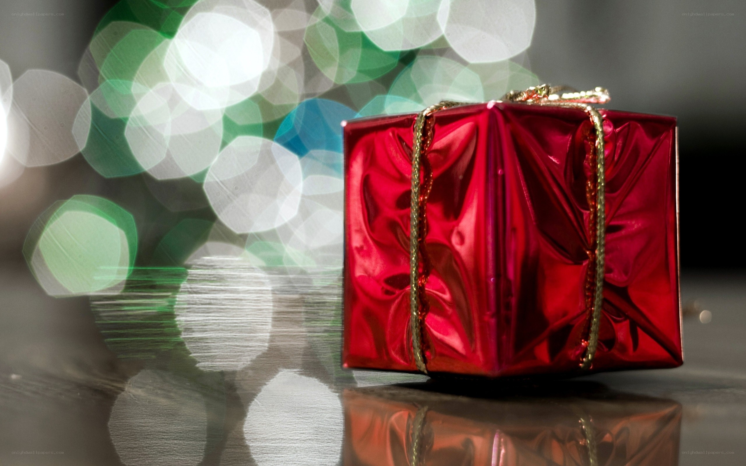 Red gift box with bokeh lights