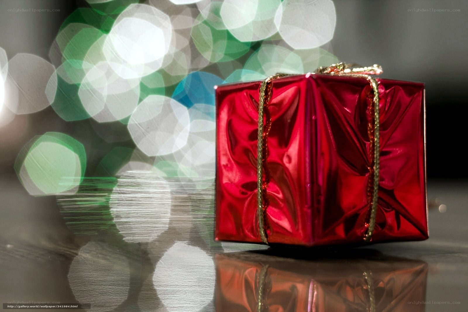 Red gift box with bokeh lights