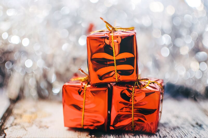 Red gift boxes on wood
