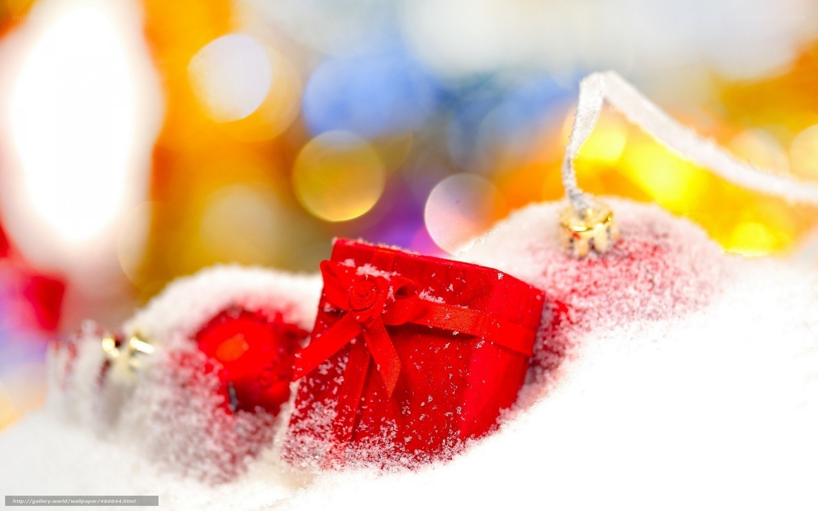 Red gift in snowy scene
