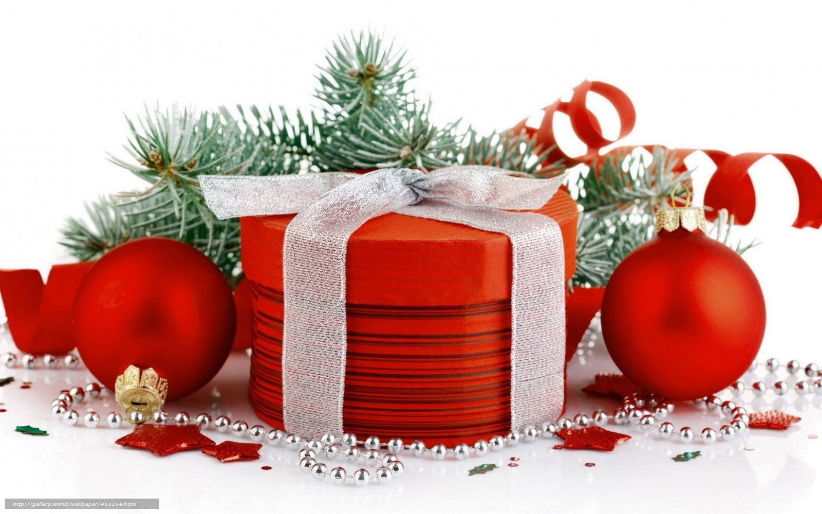 Red gift with Christmas ornaments