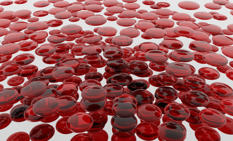 Red glass beads scattered