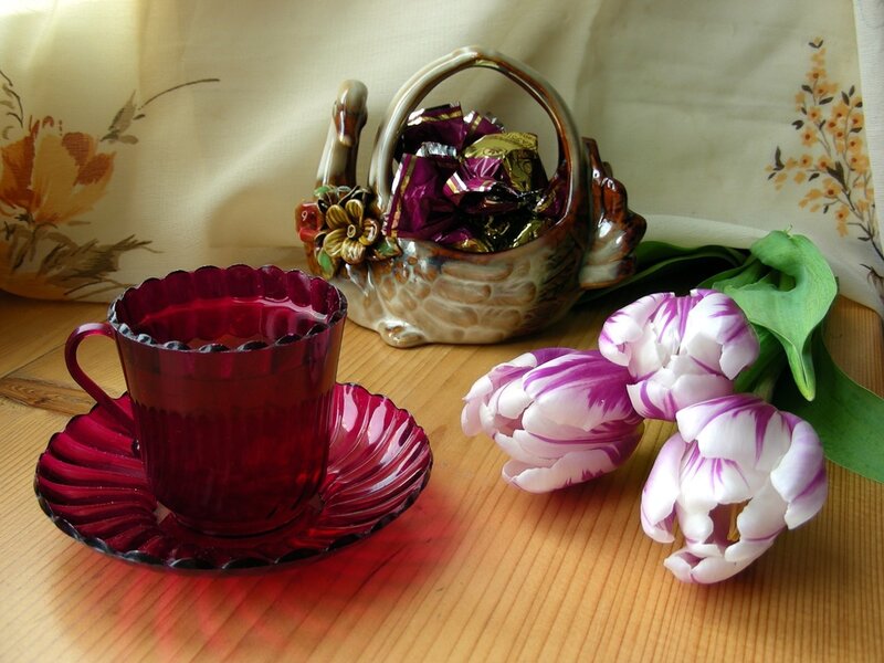 Red Glass Cup and Tulips