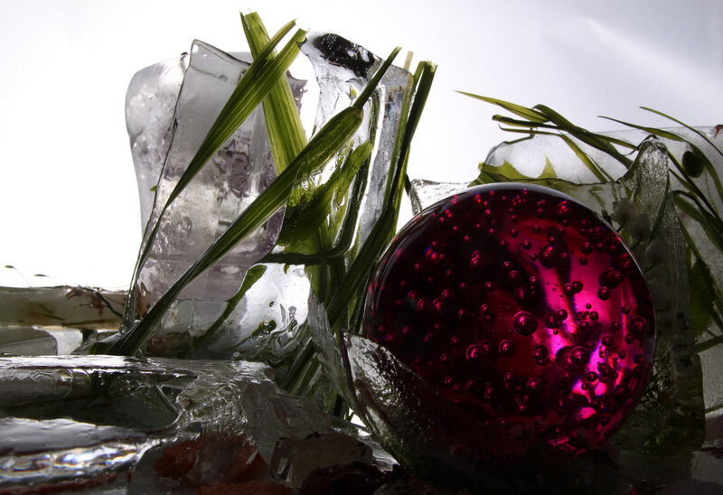 Red Glass Sphere in Ice
