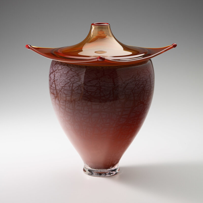 Red glass vase with lid