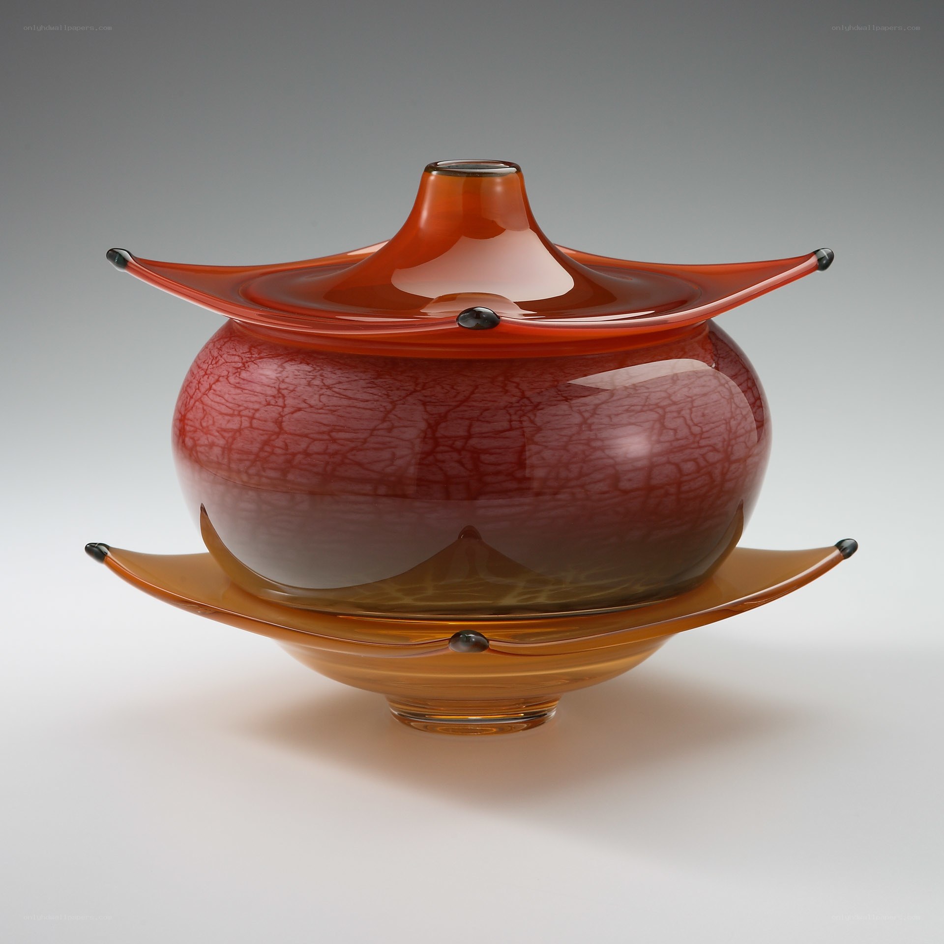 Red glass vessel with lid