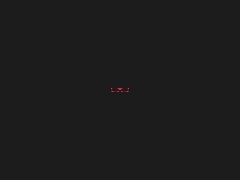 red glasses icon on black