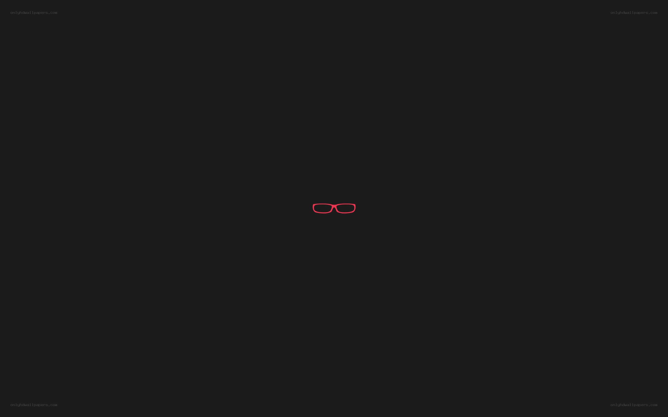 red glasses icon on black