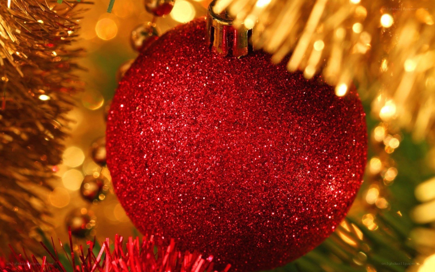 red glitter ornament on tree