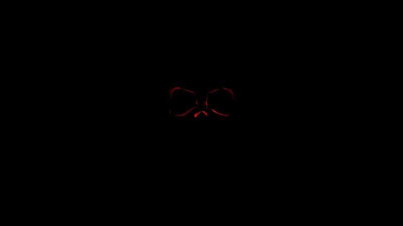 red glowing eyes in darkness