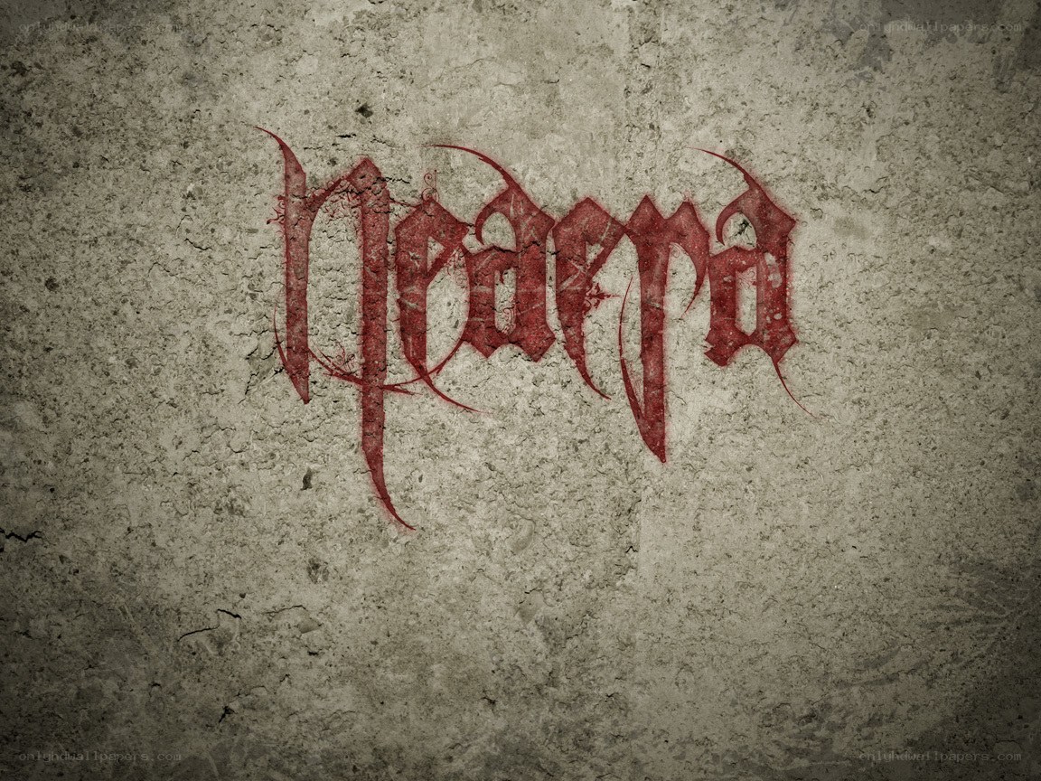 red gothic text on concrete wall