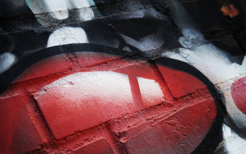 Red Graffiti on Brick