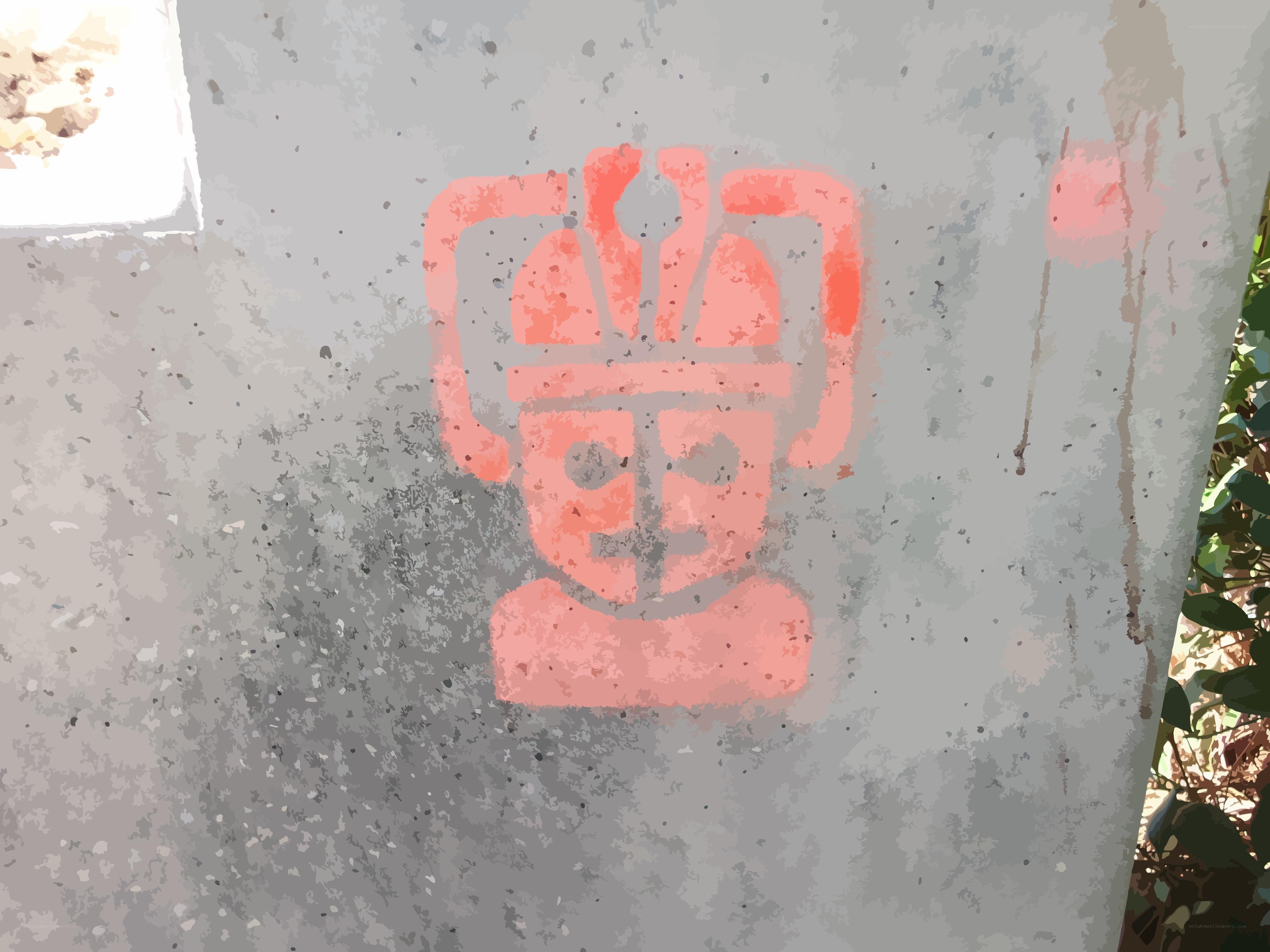 red graffiti on concrete wall