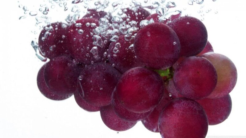 Red Grapes in Water