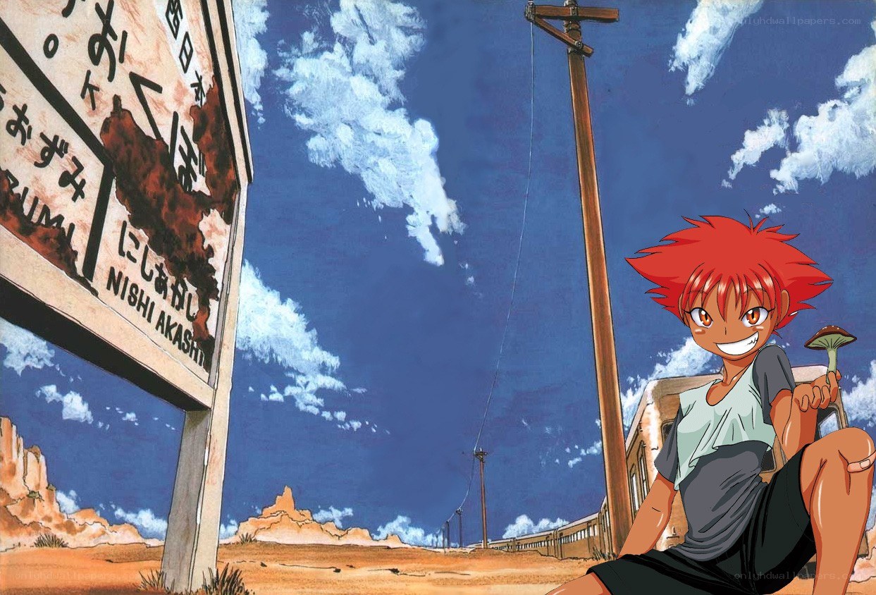 Red-haired boy in desert landscape