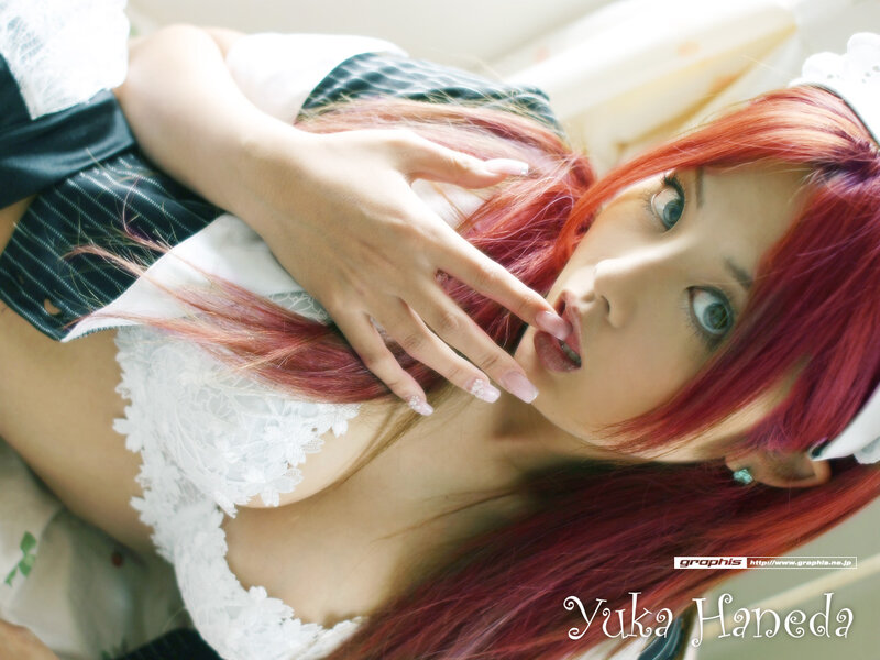 red-haired cosplayer in maid outfit