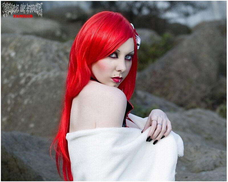 red-haired cosplayer on rocks