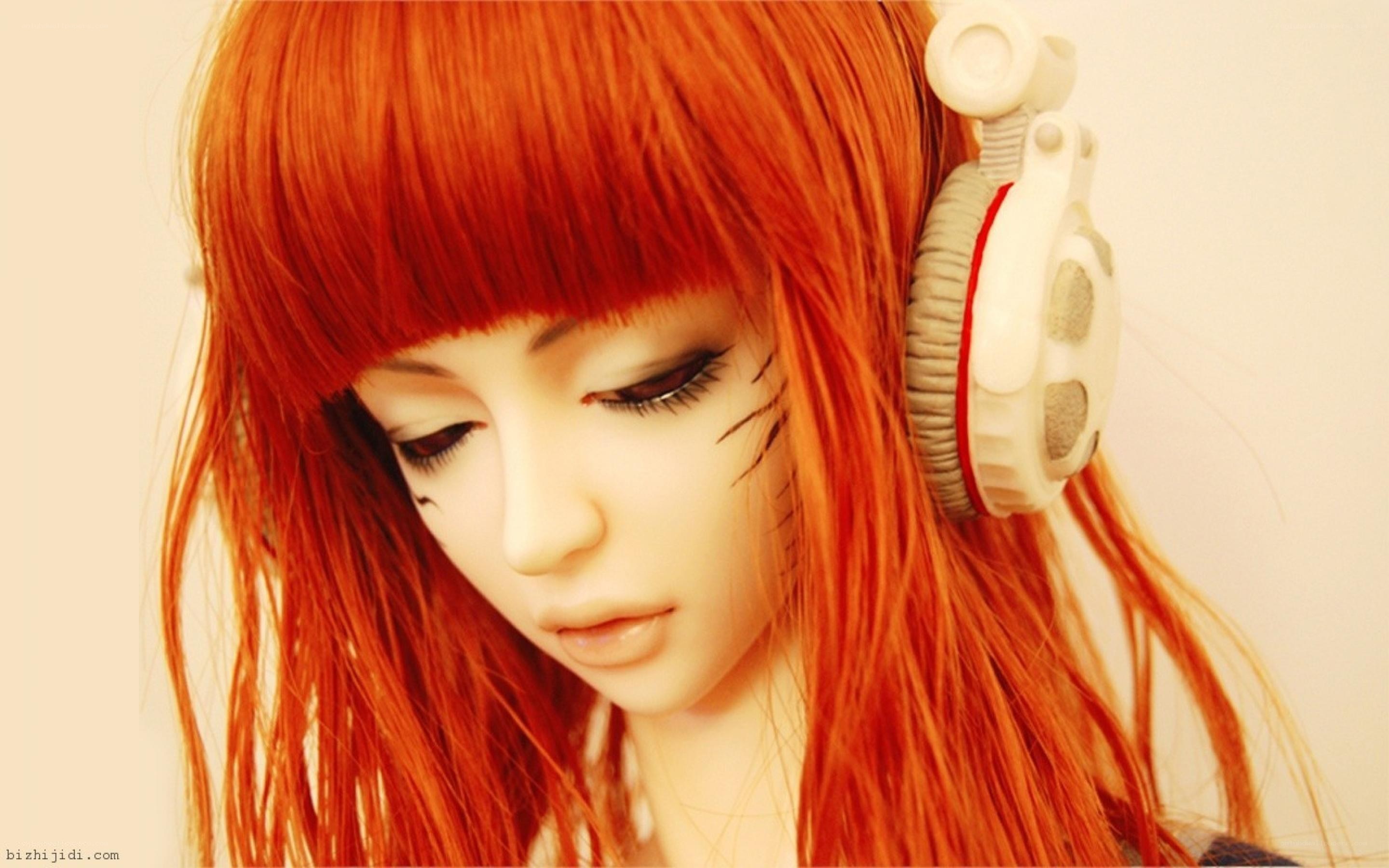 red-haired doll with headphones