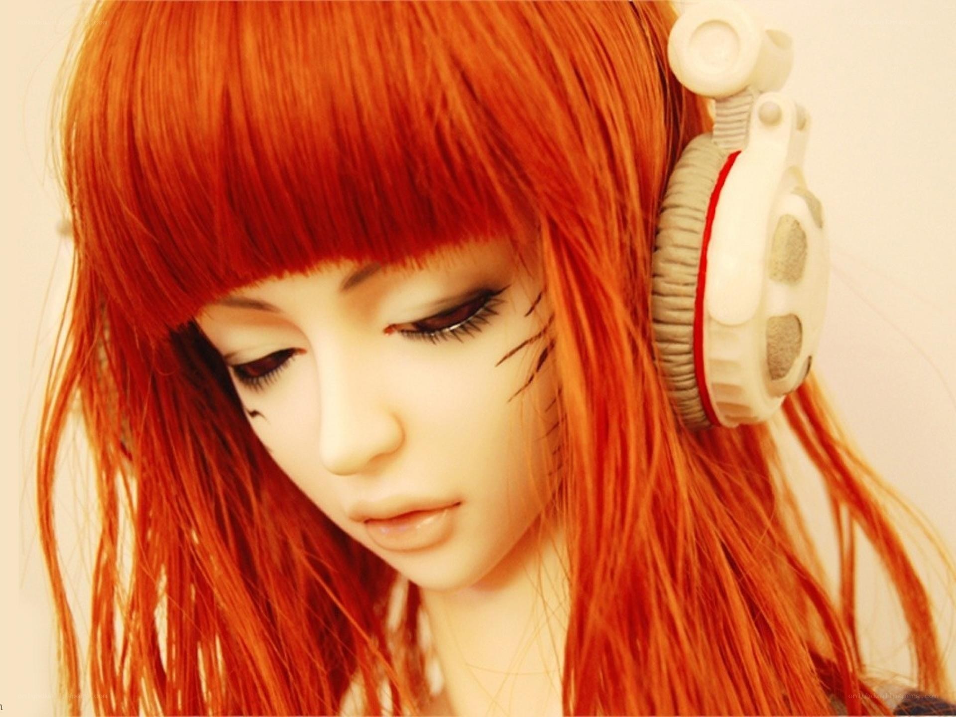 red-haired doll with headphones