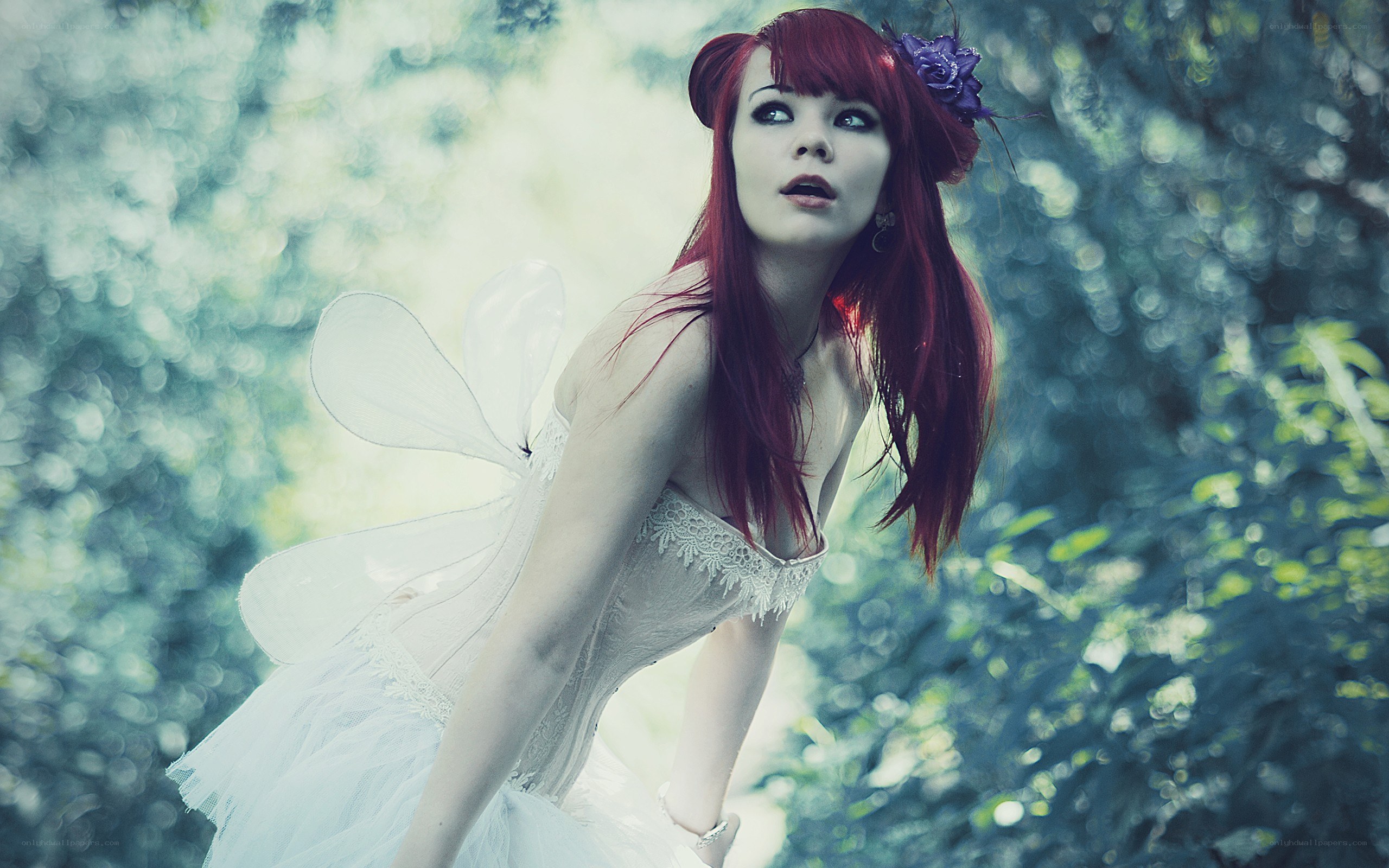 red-haired fairy in forest