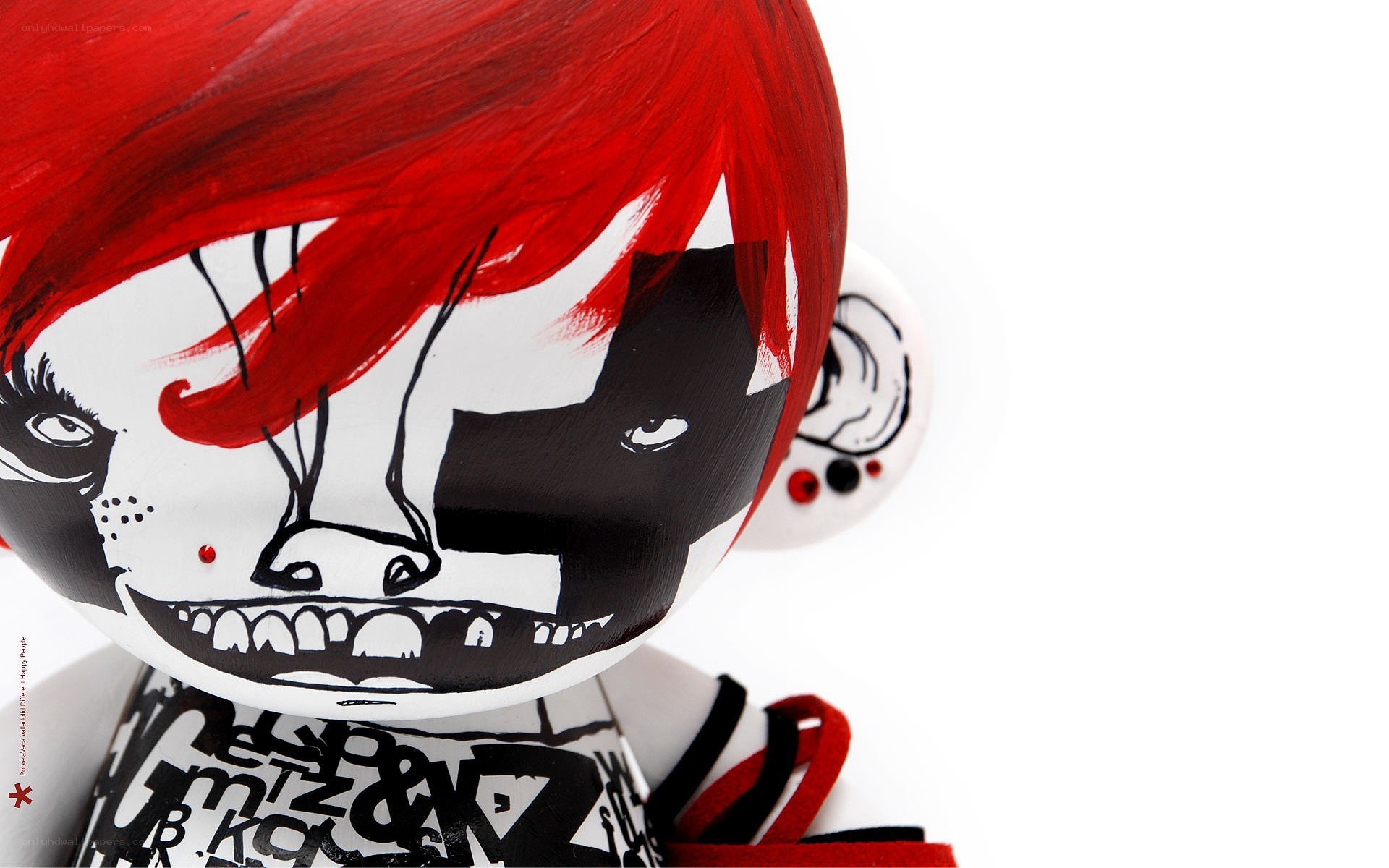 Red-haired figurine with skull design