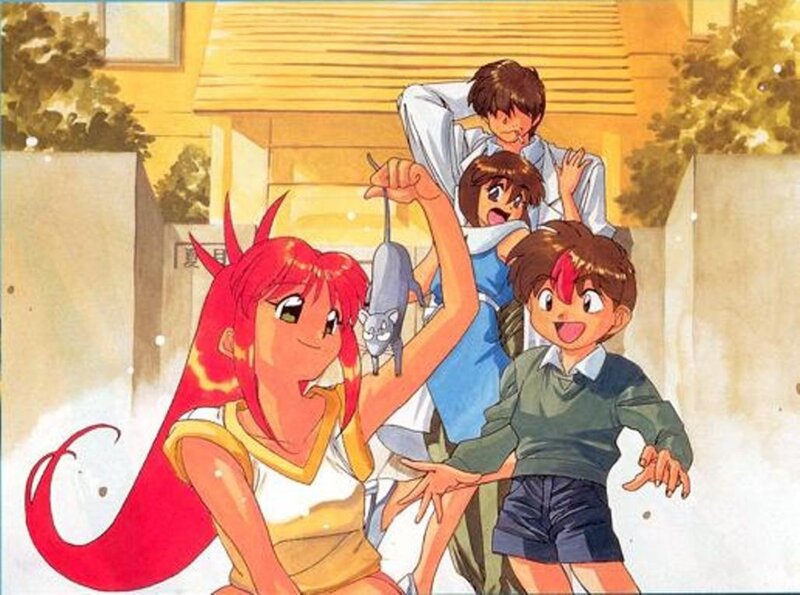 Red-haired Girl Holding a Mouse