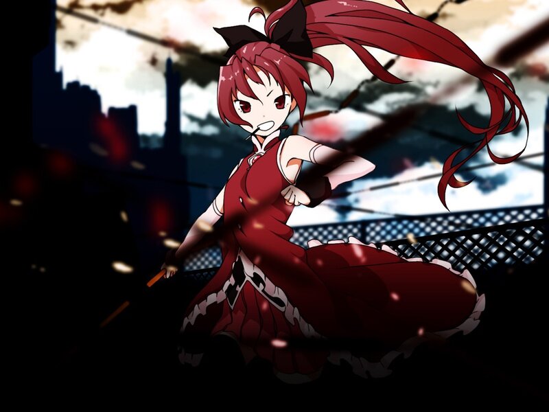 Red-haired girl in a red dress
