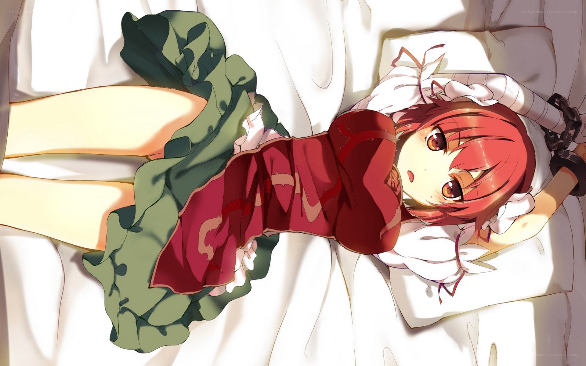 Red-haired girl in bed