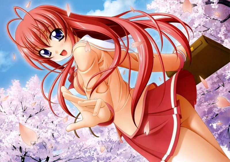 Red-haired girl in cherry blossom