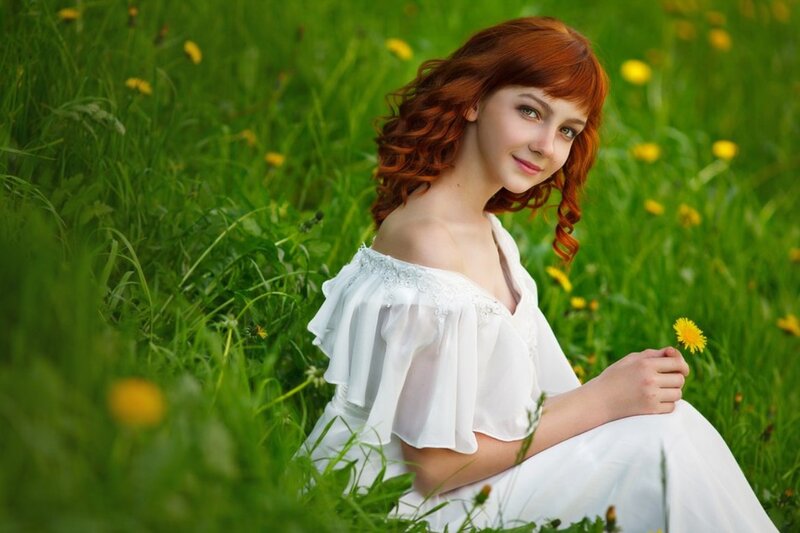 Red-haired Girl in Field — Green, Serene