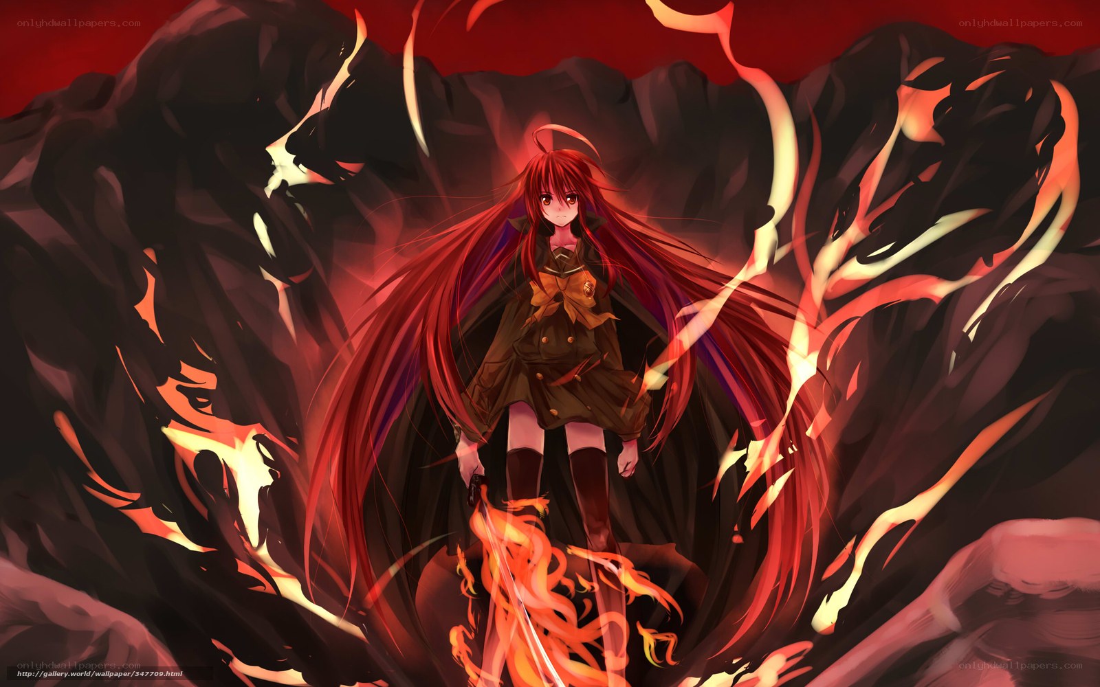 Red-haired girl in fiery landscape