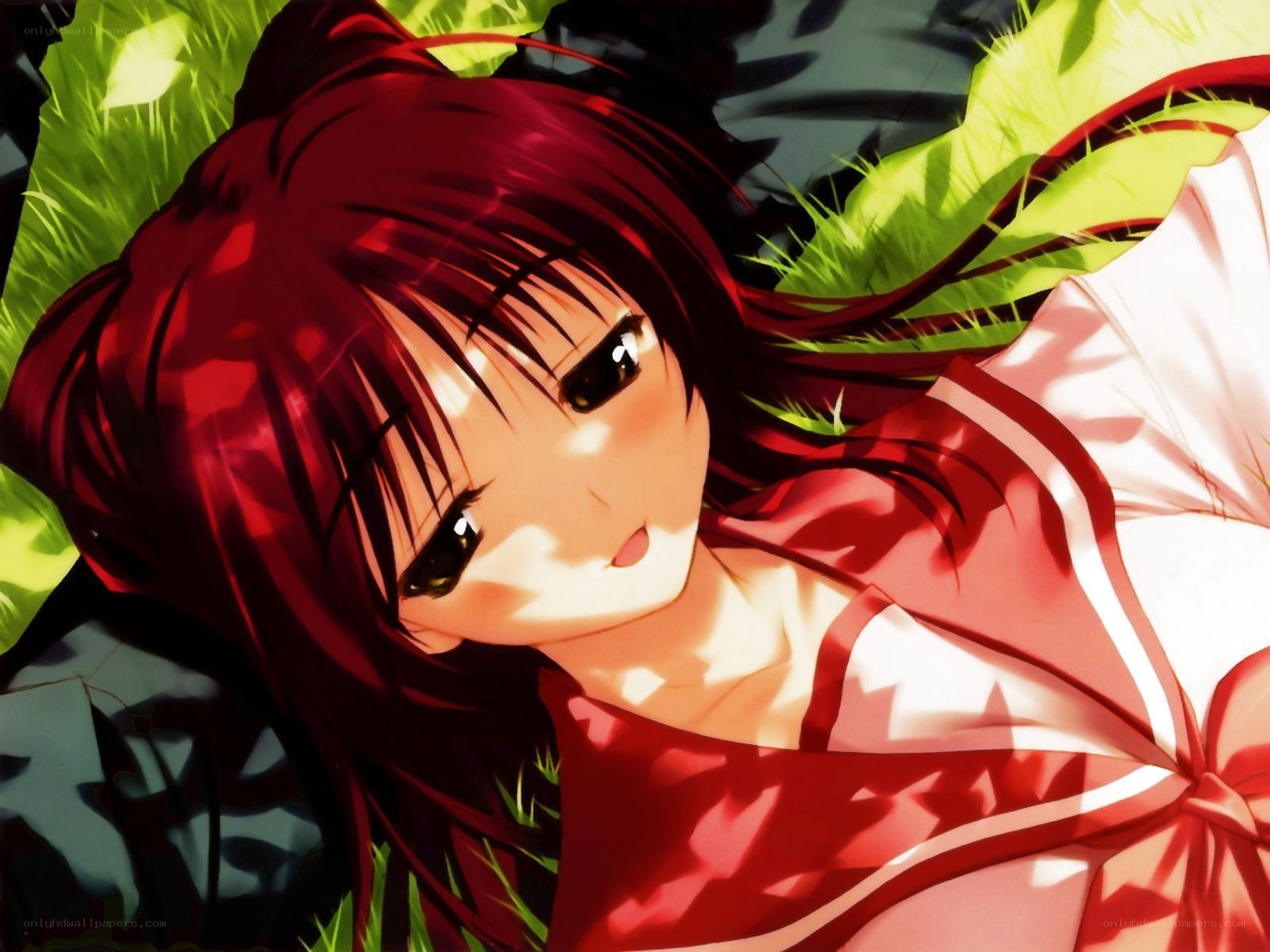 red-haired girl in grass