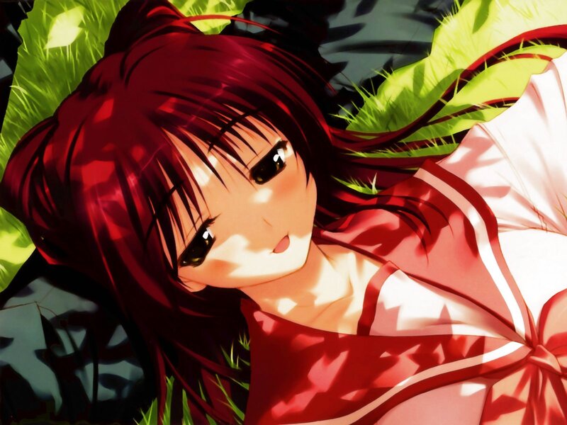 red-haired girl in grass